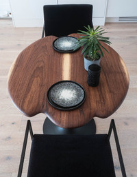 Round dining table, bistro table, solid wood top and steel base.