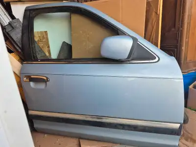 Front and rear passenger doors from a 1992 Mercury Grand Marquis. Baby blue with dark blue interior....