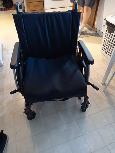 This is a Motion Composites Wheelchair designed for comfort and mobility. While it's in used conditi...
