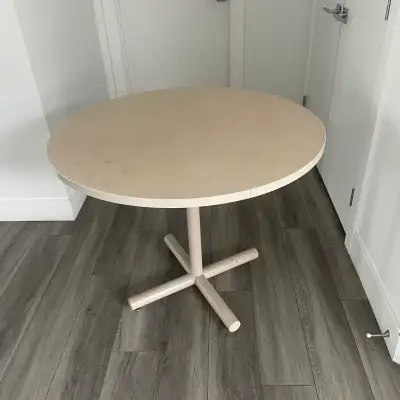 Round Pedestal Beige Table. It's Has A Sturdy Base & A Smooth Top. It's In Good Condition & Perfect...