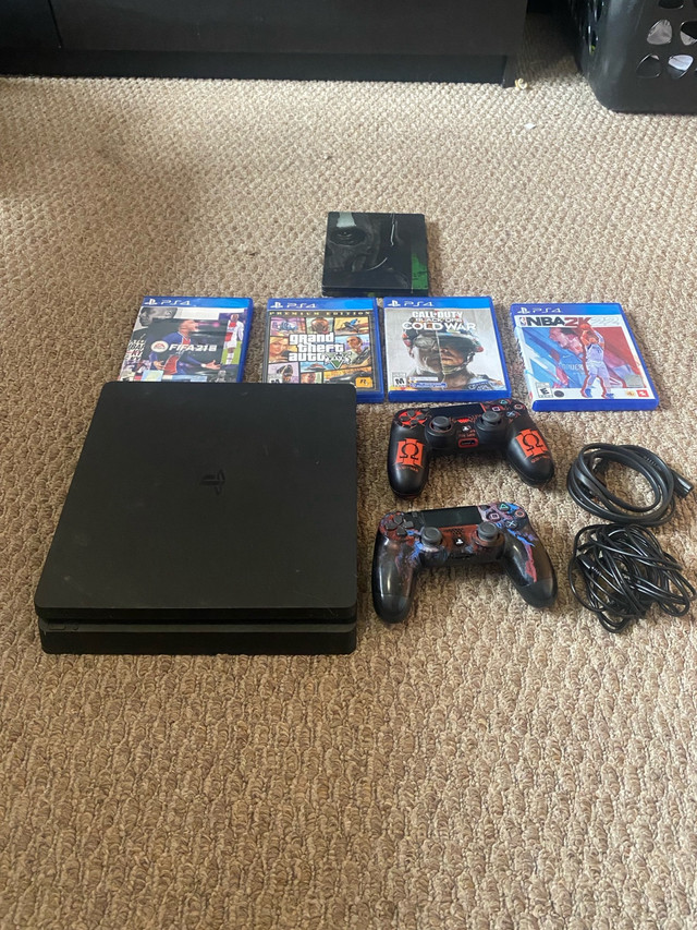 Ps4 with 2 controllers and 5 games  in Sony Playstation 4 in Calgary
