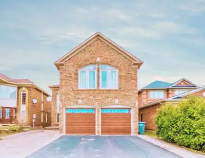 Spacious & Elegant 4 Bed + 3 Bath Detached Home with 2 Master