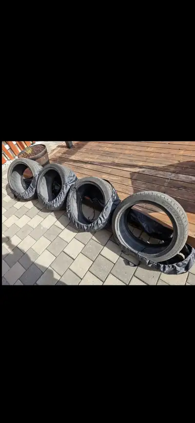 Tires have 5,xxxkm on them. Getting new tires to go with new wheel size - $1000. 235/40R18