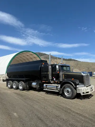 Pre emissions tri drive water truck for sale. Cat C15 Twin Turbo Eaton 18 Spd Hyd Run 3” Bowie Pump...