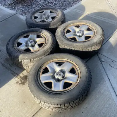 ($250 For All) Set of 4 Tires 225/65R17 And Mazda Rim. All Season Tires (M+S Rated). They Are Used....