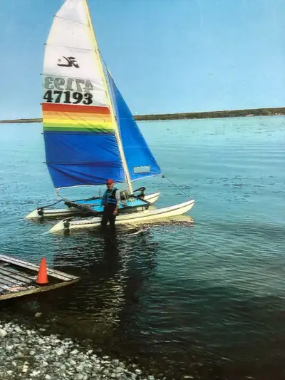 A very serviceable Hobi Cat with all brand new mast cables Main sail plus spare also has Jib sail. A...