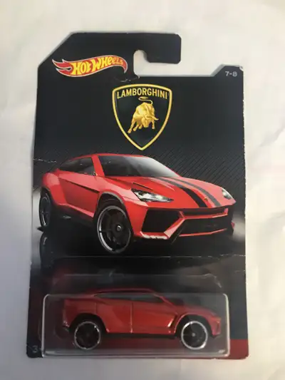 Released in 2017 as part of the Lamborghini series. Painted in metal flake red with black stripes. P...
