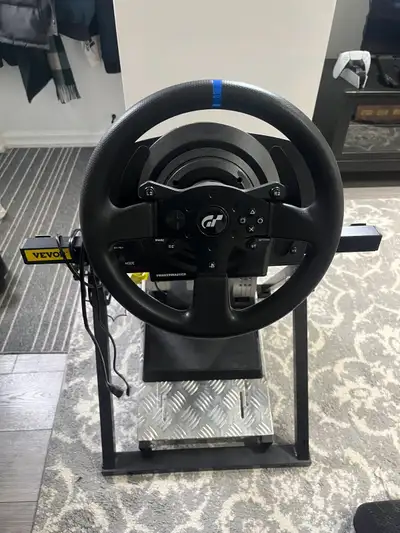 Selling my full racing wheel setup. Comes with stand, pedals, wheel, and box so you’ll be ready to g...