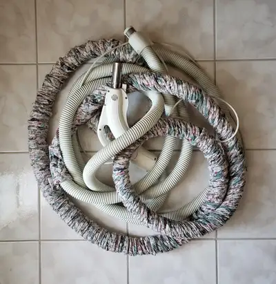 Thirty foot long central vacuum hose that was purchased at McHardy Vacuum. Non-electric central vacu...