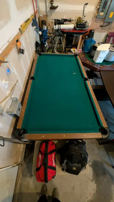 Please pickup this on June 7.. We are clearing our garage and needs to go. Nice Poker table and Pool...