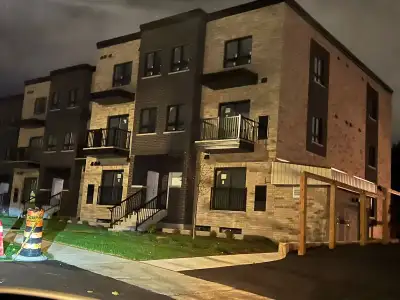 Welcome to 600 Victoria St. S. in Kitchener. This end unit bright and spacious 3 storey stacked town...