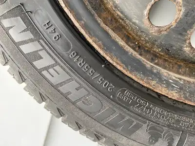Michelin X-ICE on rims 205 55R16 coming off 2014 Honda Civic. 1 rim slightly bent but holds air.