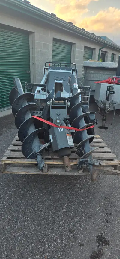 Auger attachment for a bobcat mt. Also 10 inch and 12 inch auger bits. Open to any offers need gone...