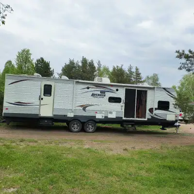 A home away from home. 2013 Avenger , 36ft, 7600 lbs. Clean, bright and spacious trailer. Well cared...