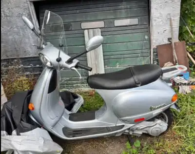 2005 Silver Vespa in great condition. Model M19 Only 3630 miles on the odometre. Gas powered, goes u...