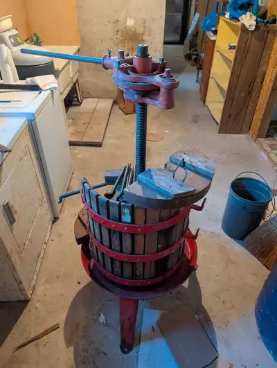 I'm selling a used wine press, perfect for small-scale winemaking or cider production, featuring a s...