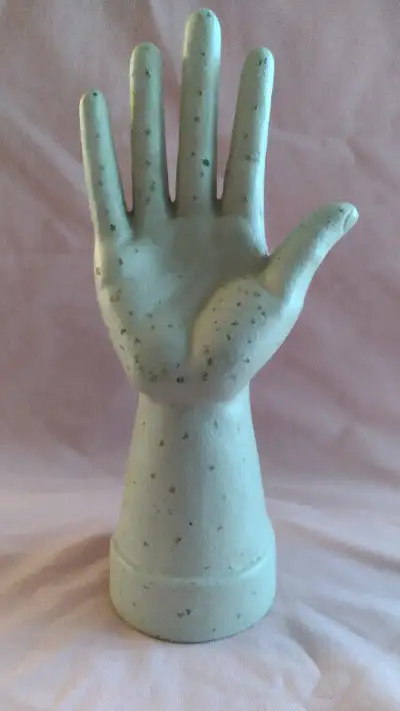 A NICE VINTAGE HEAVY CAST IRON HAND FOR DISPLAYING YOUR RINGS AND JEWELRY IT IS IN PERFECT CONDITION...