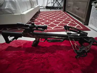 Brand new crossbow only been shot once Comes with 4 hunting arrows 2 training arrows Pull back rope...