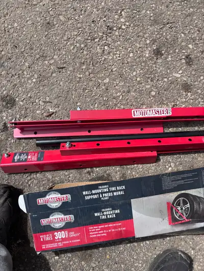 Selling brand new motor master tire rack. Includes all mounting hardware obo