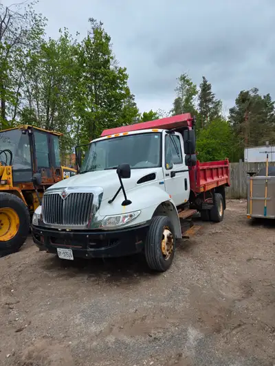 2012 International 4300 Durastar. Dump box with fold down sides. Well maintained. Commercial Saftey...