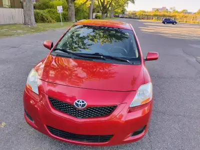 2009 Toyota Yaris -Automatic -4 door -Red colour -Climate control air conditioning -Air bags -ABS Ad...
