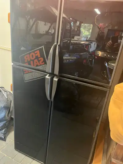 Dometic RM 1350 RV Fridge. Four door, 2019 model, Gas and propane. Looks good and works fine.