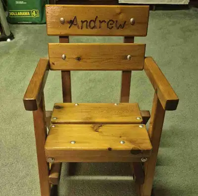 Childs Wooden rocking chair. , View more