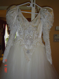 Wedding dress Bella di Sera size 8 Cleaned at Miss Browns!..