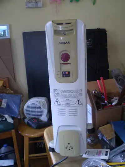 NOMA EW2307C OIL FILLED PORTABLE SPACE HEATER 1500 WATTS- $50, View more