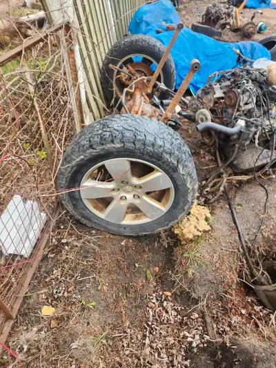 I am selling a used rear axle from a 2010 Dodge 1500. as seen in the photos, with some rust and weat...