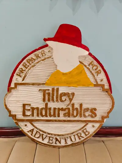 Tilley Endurables Store display fauxwood sign, View more