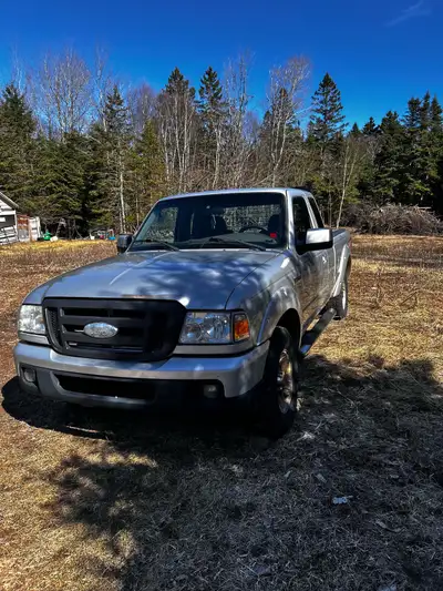 2006 ford ranger needs front ball joint and rockers other than that runs perfect. Van is a 2012 dodg...