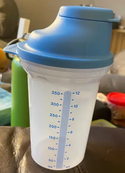 Tupperware measuring Cup & lid, View more