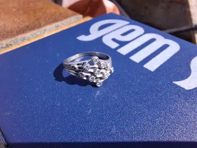 Bezel setting white gold 11 round diamonds, View more