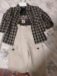 Brand new hat and kids clothes with tag