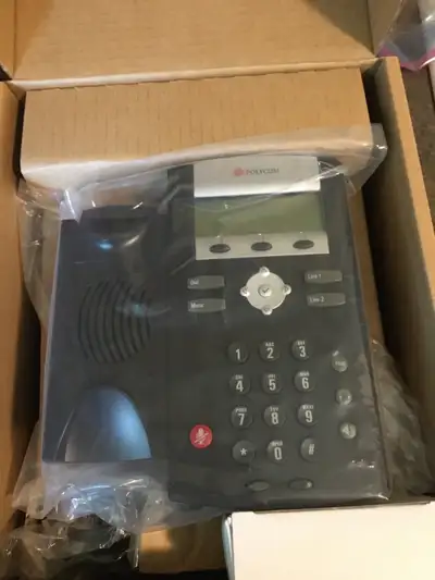 This Polycom Soundpoint IP 330/320 Desktop Phone is brand new and still in the box. Manual included.