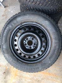 winter studded tires on steel wheels
