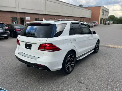 BLACK EDITION: White with tan Leather - GLE400 4Matic All Wheel Drive. 20 Inch AMG Sport Wheels. Bla...