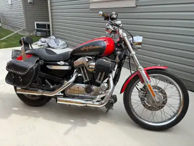 Selling my 2006 Harley-Davidson Sportster XL1200 Custom. This bike has 66,675 km and has been a reli...