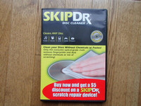 NEW / NEUF SkipDr disc cleaner cloth for CD, DVD, optical disks
