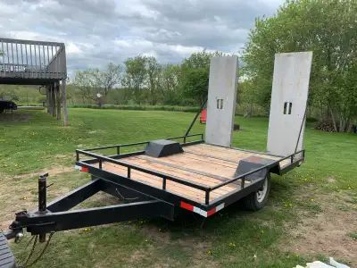 79”x 120” lights work tows good removable ramps solid no rot new hitch and jack $1000