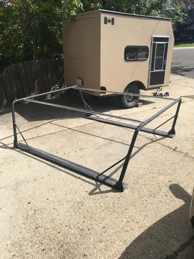 Boat or ladder rack. Keep your canopy on the truck when using this rack. 80” long. $200