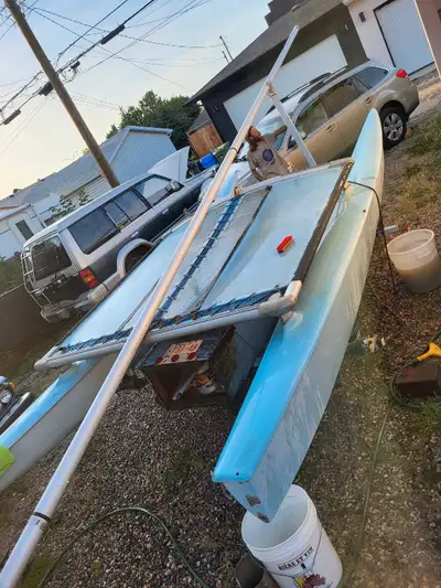 Hobie 16 Catamaran. All the sails and rigging are in good shape. No tears in the trampoline. Comes w...