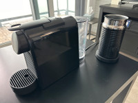 DeLonghi Nespresso With Milk Frother over 210 pods