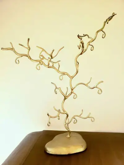 This is a solid metal tabletop jewelry display stand for hanging necklaces on to sell. Great for a s...