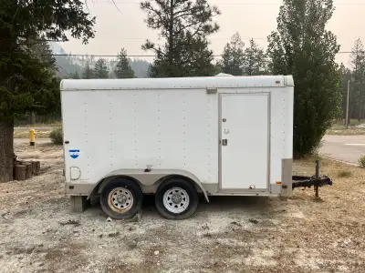 6x12 Tandem Axle Enclosed Trailer Installed locking deadbolt on side door for extra security Comes w...