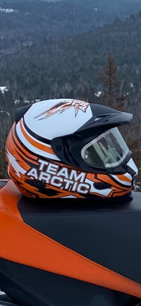 Arctic Cat helmet and snowmobile suit