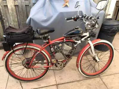 50 cc mining motor on a supercycle bike frame it runs ok it just doesn't have any brakes that's why...