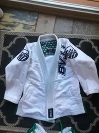 2 Kids jujitsu suits 6-9 and 10-13. Near new condition.