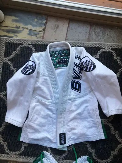 2 Kids jujitsu suits 6-9 and 10-13. Near new condition., View more